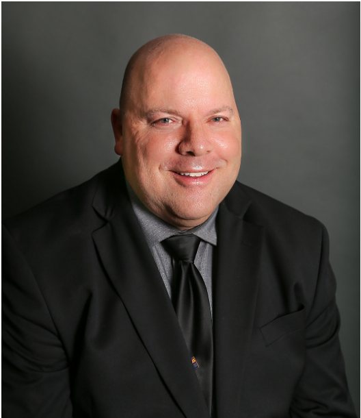 Portrait of David Callister in a suit